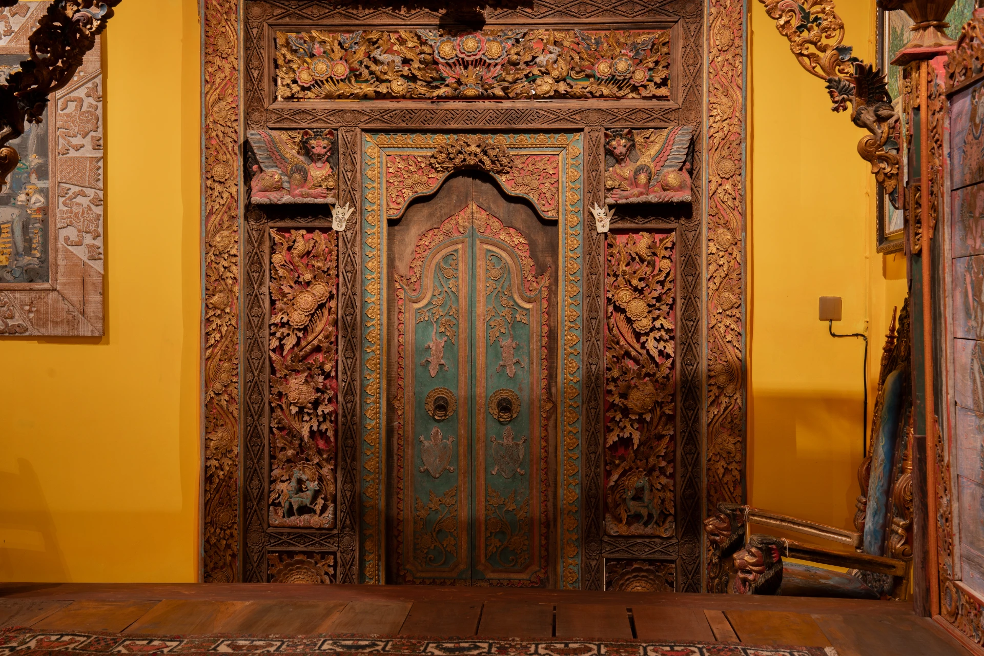 Door Ornament Balinese carved wooden doorway in the Bale Gede Room, Museum Peter Bloch Collection.