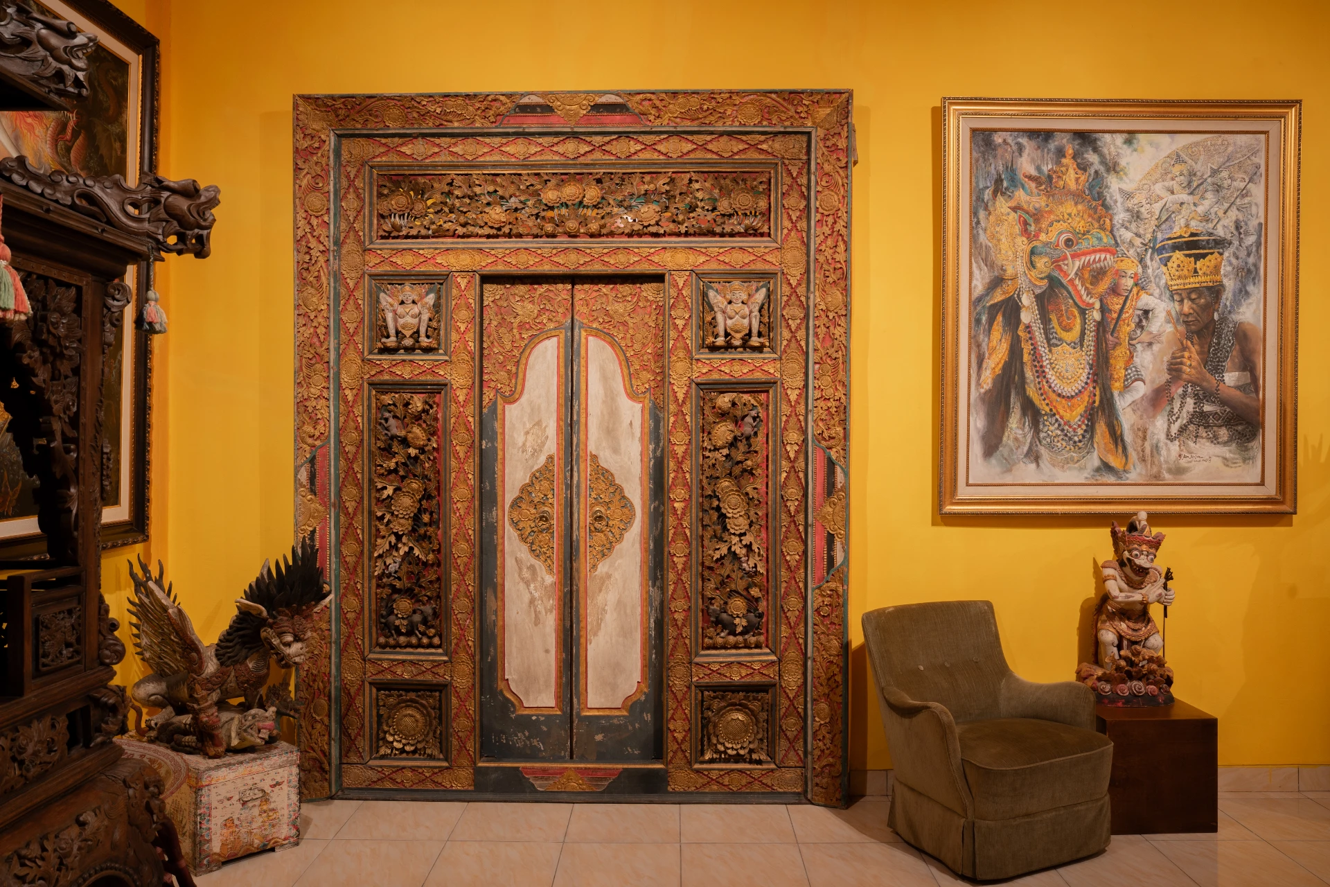 Front side Balinese carved wooden doorway in the Bale Gede Room, Museum Peter Bloch Collection.